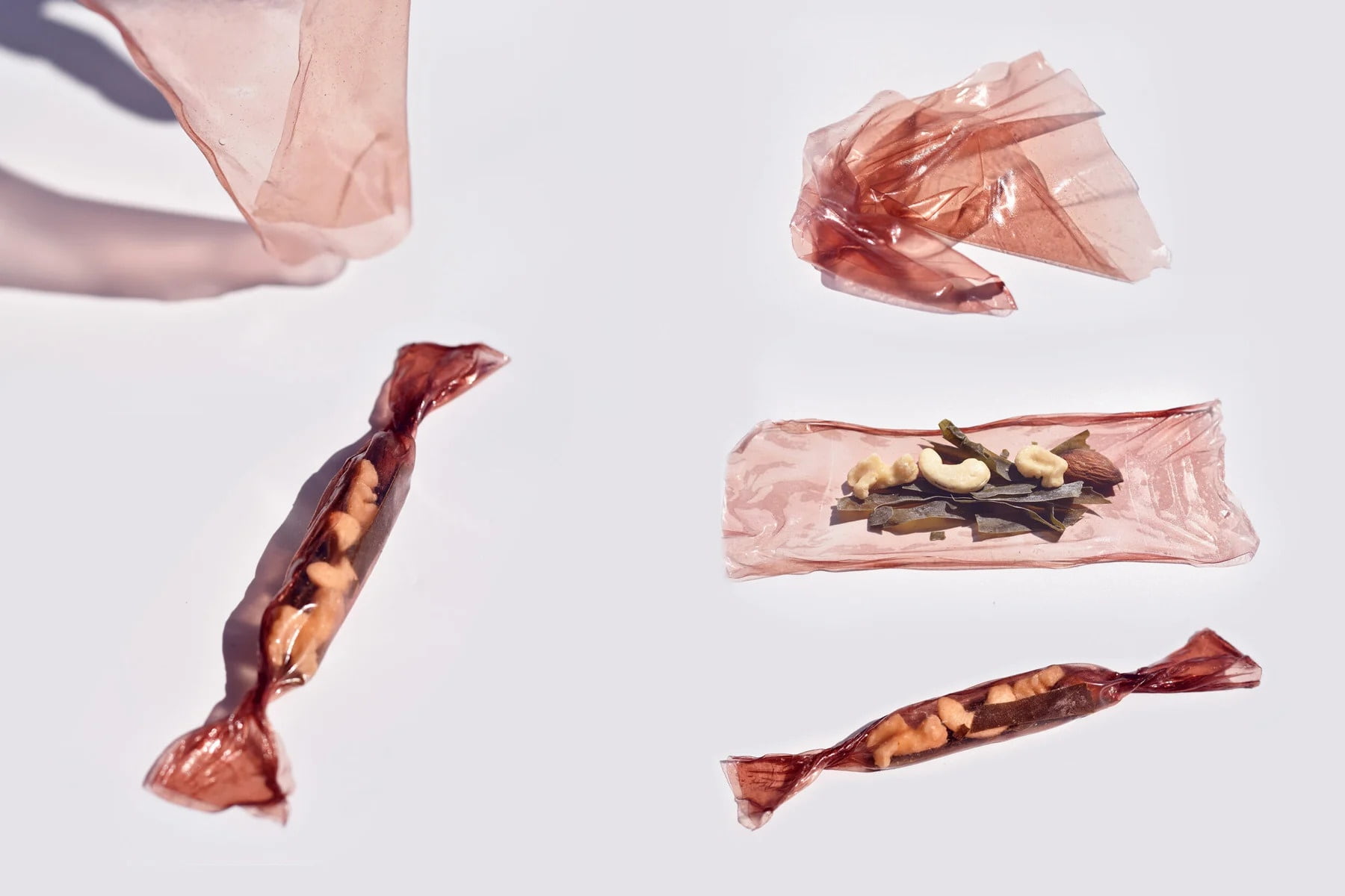 Nuts and snacks wrapped in edible wrappers.
