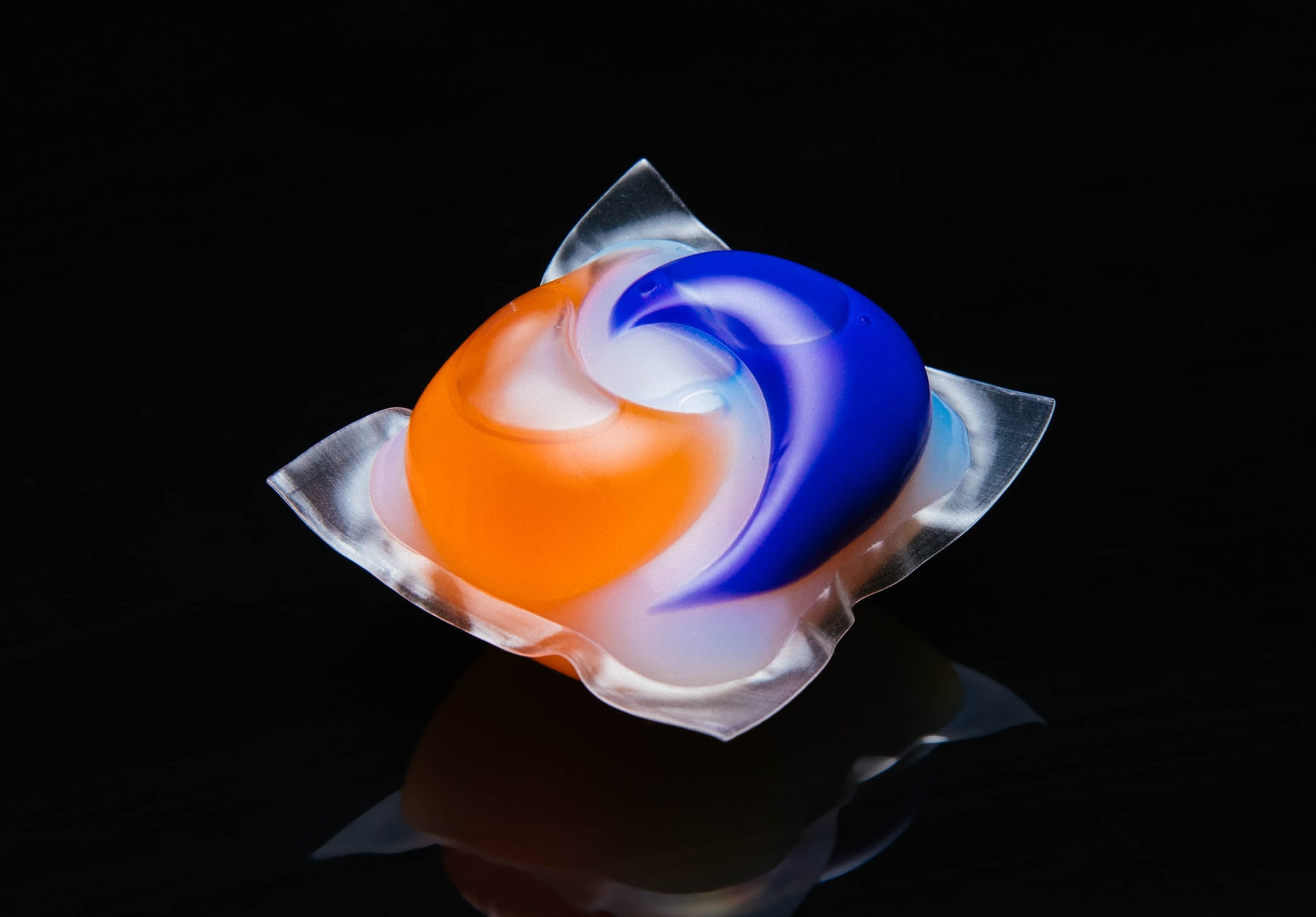 Tide pod on the black background as an example of flexible packaging.